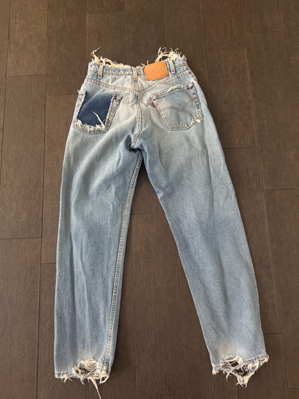 Vintage Levi's Light Blue Distressed High-Waist Jeans from Vintage Twin
